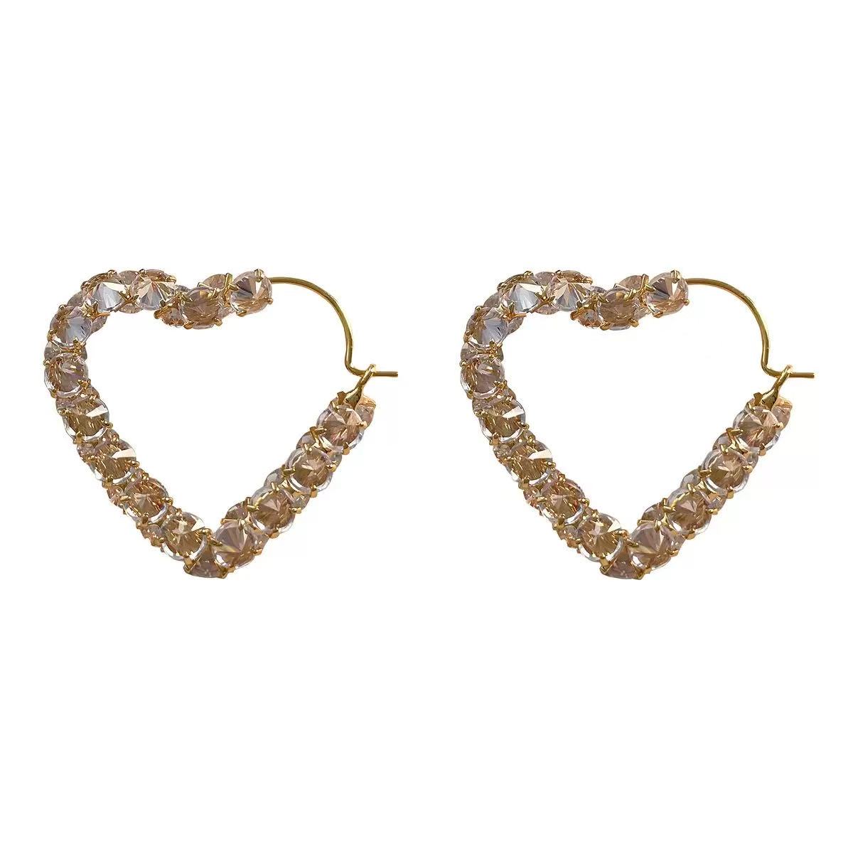 Flashing love circle earrings peach heart popular niche design stud earrings light luxury high-end earrings